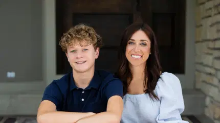 Hemophilia patient Paxton and his caregiver Jenny